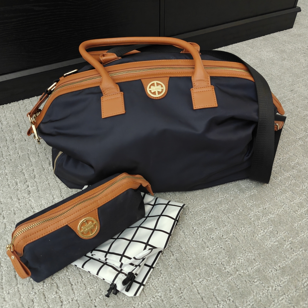 Black and Tan Travel Bags with Leather Accents